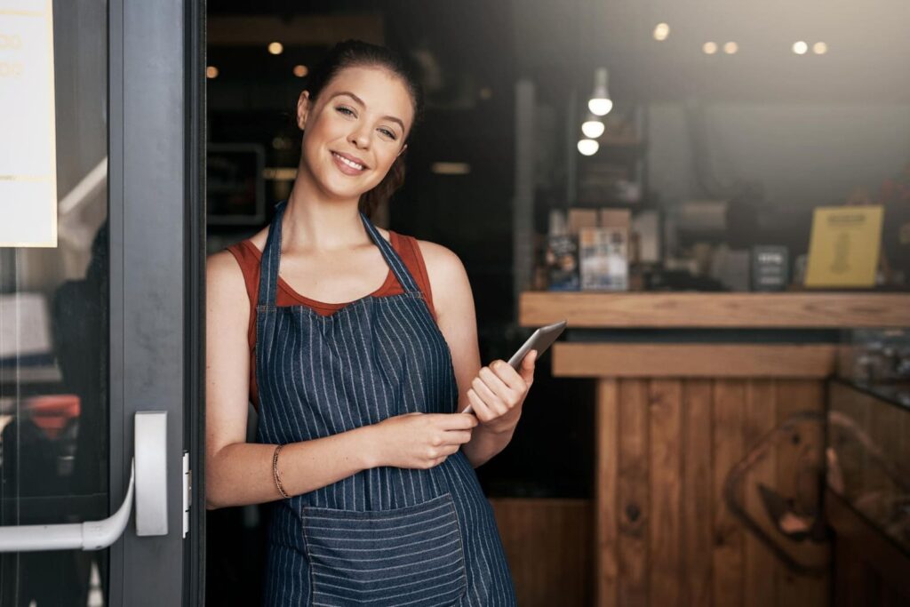 A restaurant owner smiling and knowing about restaurant marketing