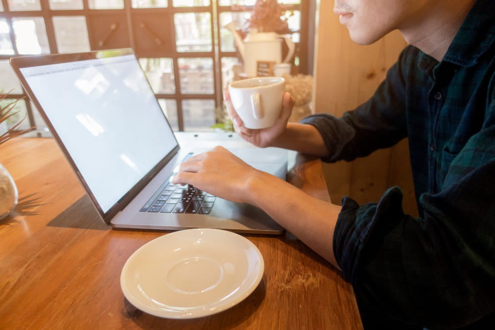 A man working on Local SEO for Cafes