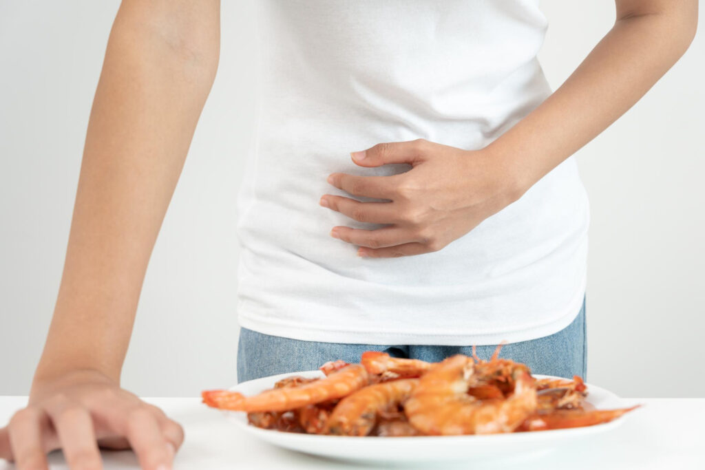 A person have reaction after eating food
