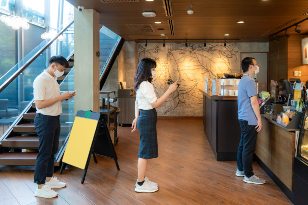 People lining in queue in a restaurant