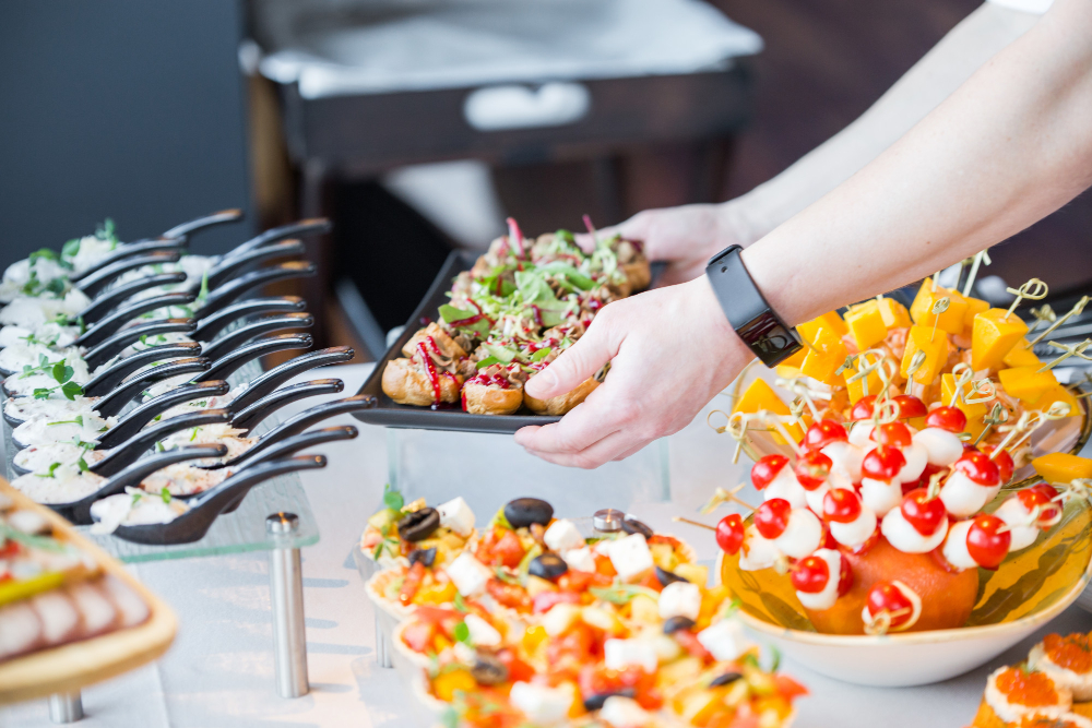 Grabbing a buffet dish
