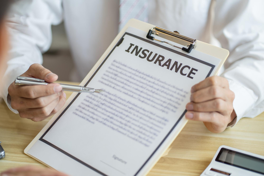 A man showing an insurance form