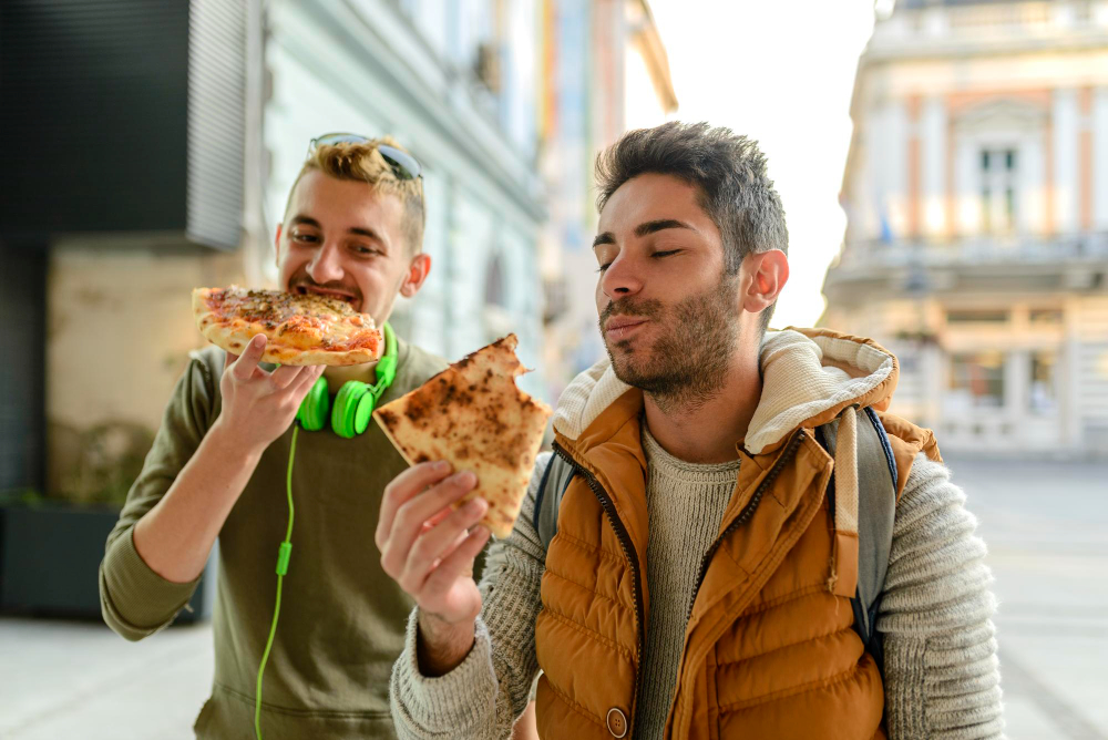 Customers enjoying pizza